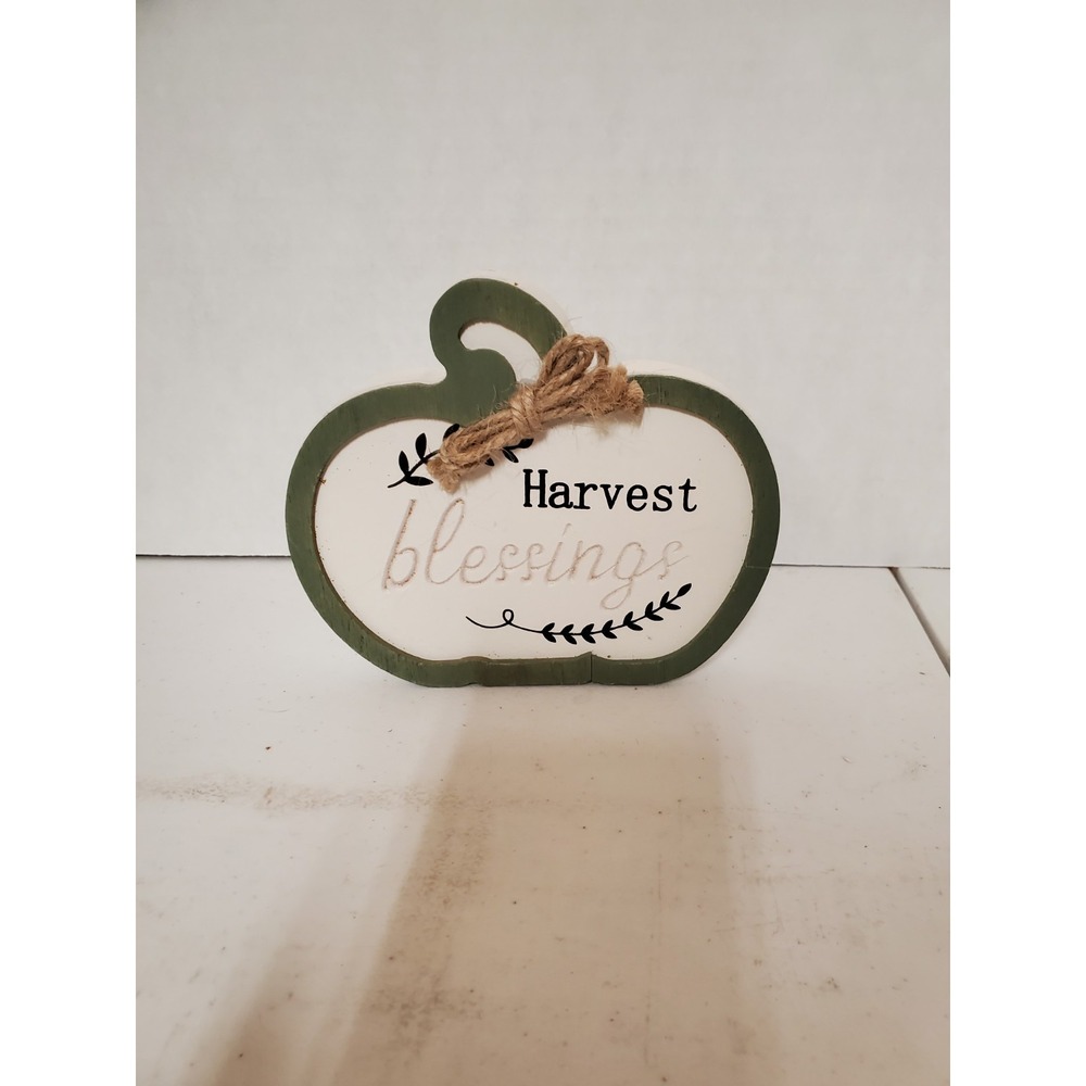 rustic pumpkin-shaped tabletop sign‎ typically used as a seasonal Decoration
